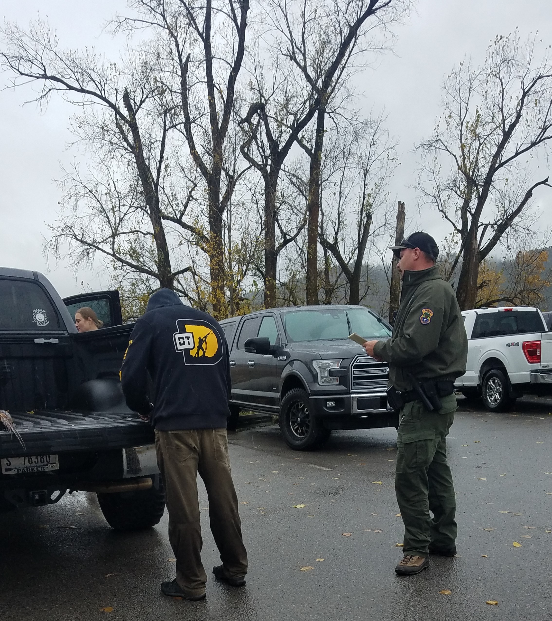 Conservation officer contacting a sportsman