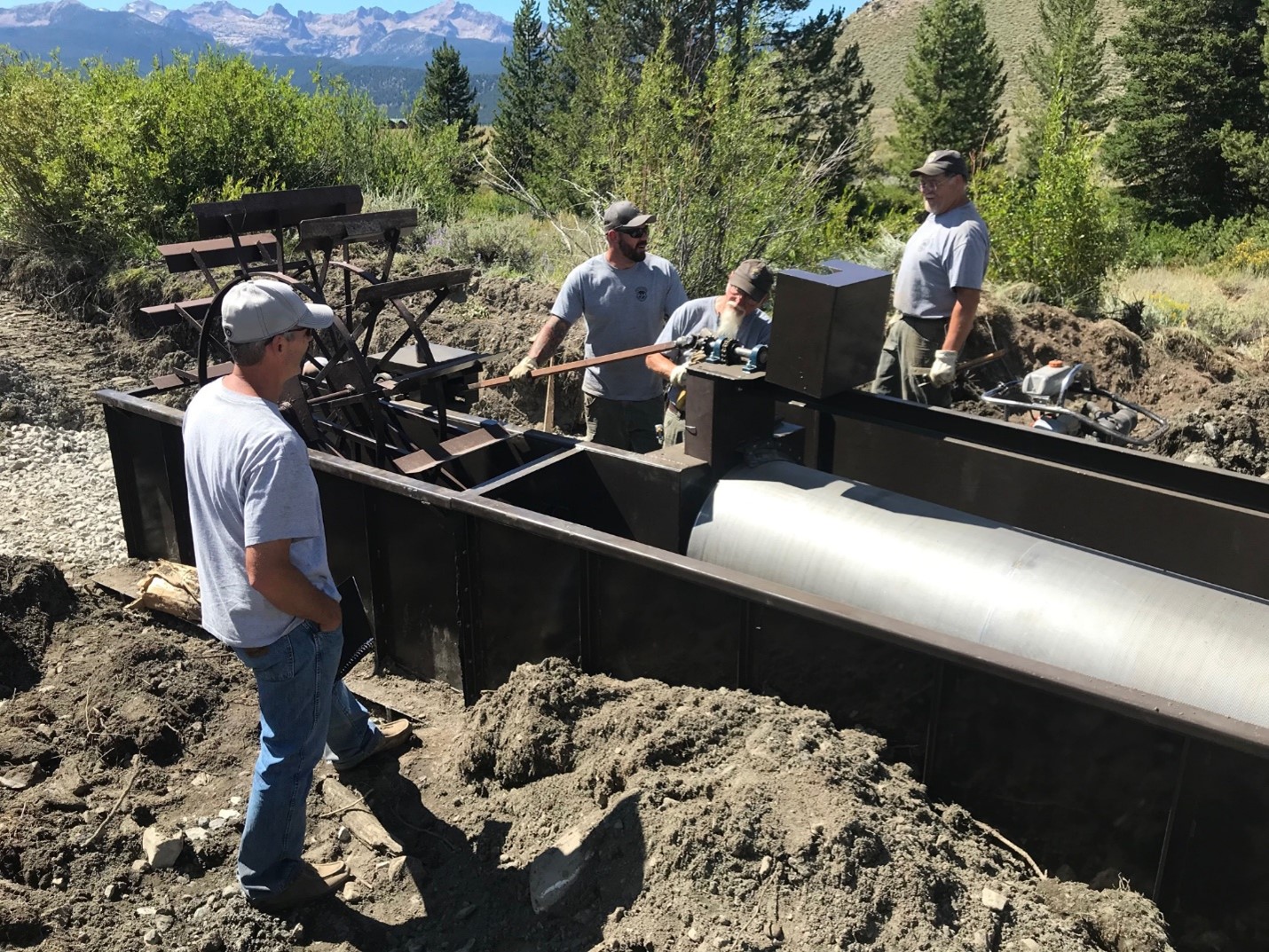 photo of Jared overseeing installation phase of a fish screen project