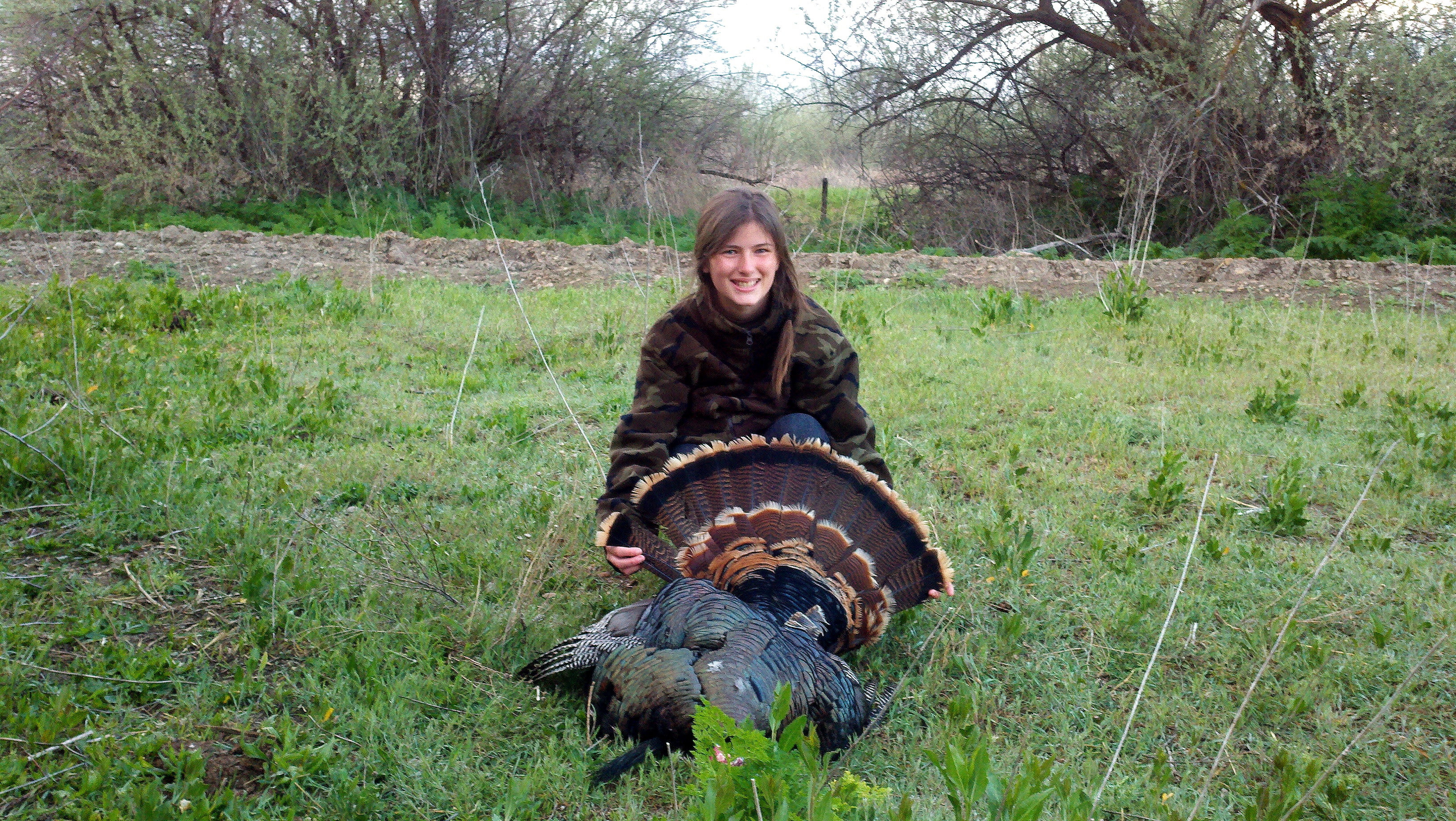 girl with her turkey from the youth turkey hunt at the Fort Boise Wildlife Management Area WMA April 2014