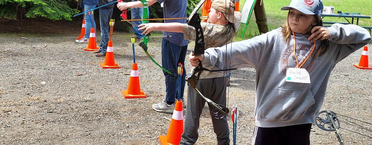 Youth archers at the Farragut Shooting Range Center
