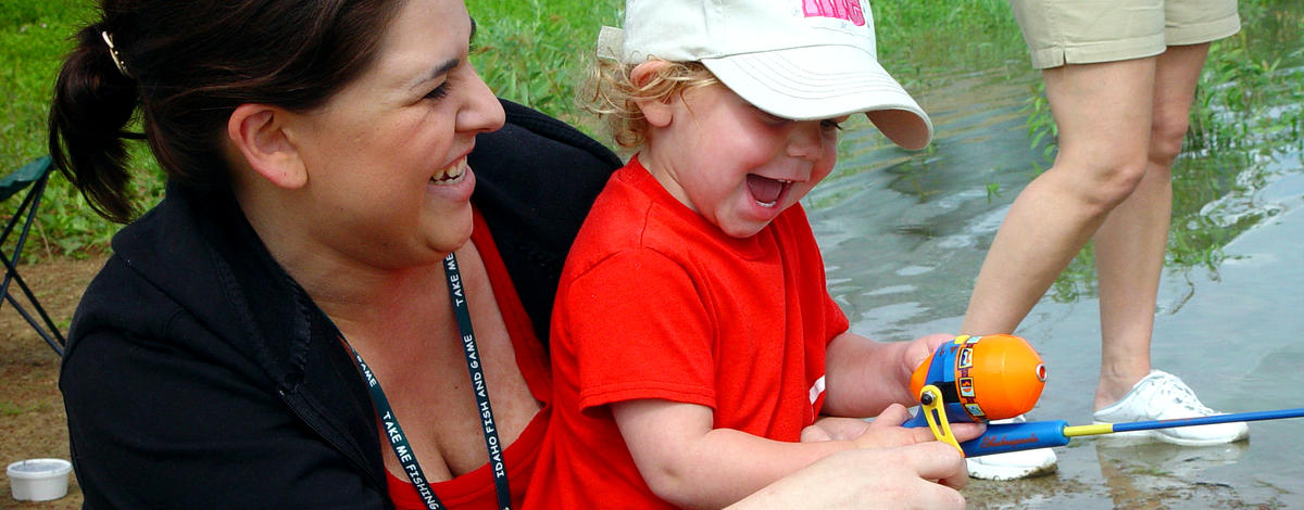Young angler and mom