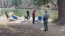 Fish and Game Conservation Officer contacting a sportsmen