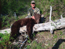 hunter with his bear 