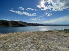 Sun peeking through the clouds over Mackay Reservoir